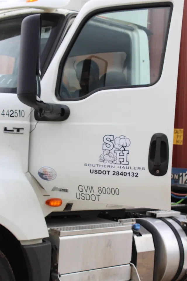 Southern Haulers Freightliner tractor staged on the Ailey yard apron, 2024